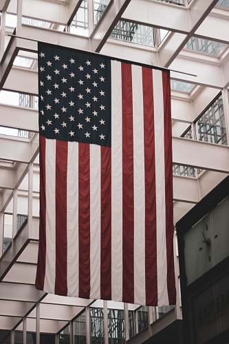 flag USA flag hanging on metal tube symbol